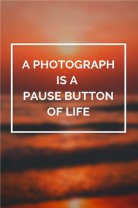 A Photograph is a Pause Button of Life