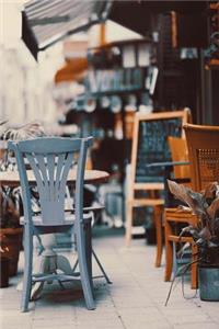 A Blue Chair at an Outdoor Cafe Journal