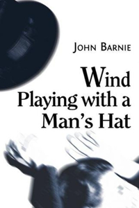 Wind Playing with a Man's Hat