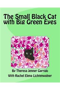 The Small Black Cat with Big Green Eyes