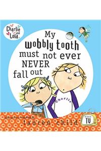 Charlie and Lola: My Wobbly Tooth Must Not ever Never Fall Out