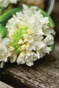 Romantic White Hyacinth Flowers on a Rustic Bench in the Garden Journal