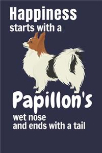Happiness starts with a Papillon's wet nose and ends with a tail