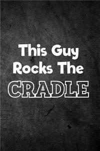 This Guy Rocks the Cradle