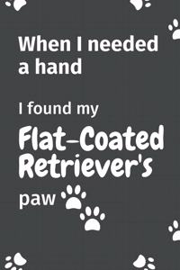 When I needed a hand, I found my Flat-Coated Retriever's paw
