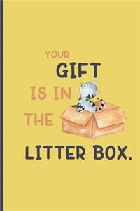 Your gift is in the litter box.