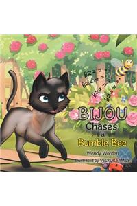 Bijou Chases a Bumble Bee