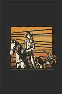 Cowboy In Sunset