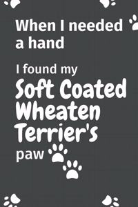 When I needed a hand, I found my Soft Coated Wheaten Terrier's paw