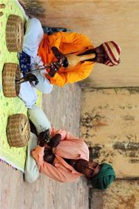 Snake Charmers at work in India Journal