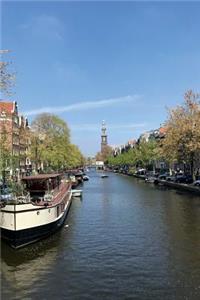 Pleasure Boats on Canal in Amsterdam Holland Netherlands Journal