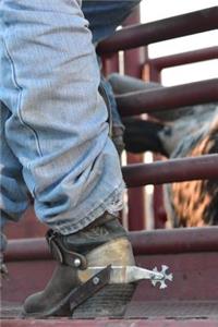 A Cowboy Boots and Spurs at a Rodeo Journal