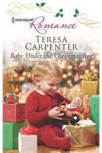 BABY UNDER THE CHRISTMAS TREE