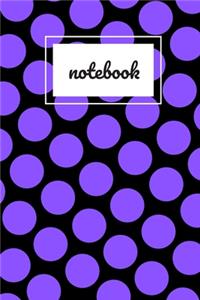 Black and purple polka dot print notebook