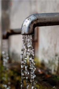 A Water Faucet Journal: 150 Page Lined Notebook/Diary