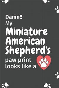 Damn!! my Miniature American Shepherd's paw print looks like a