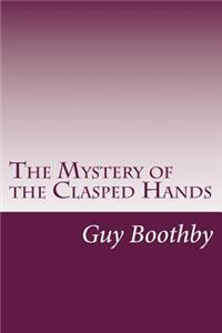 Mystery of the Clasped Hands