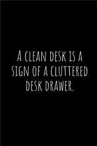 A Clean Desk Is a Sign of a Cluttered Desk Drawer.