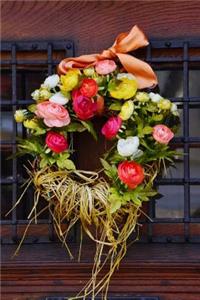 A Lovely Floral Wreath on an Old Wooden Door Journal