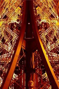 Lit Up Beams of the Eiffel Tower in Paris, France Journal