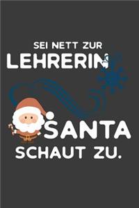 Sei nett zur Lehrerin Santa schaut zu