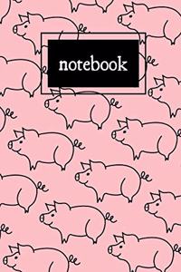 Pink and black pig print notebook