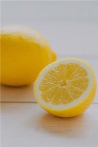 A Bright Yellow Sliced Lemon Citrus Fruit Journal