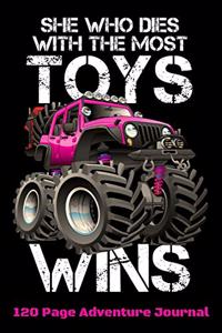 She Who Dies With The Most Toys Wins
