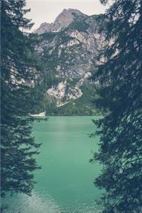 A Mystical Turquoise Lake Nestled in the Italian Alps Italy Europe Journal