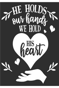 He holds our hands We hold his heart