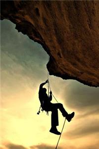 Climber Rappelling Off the Mountain Journal