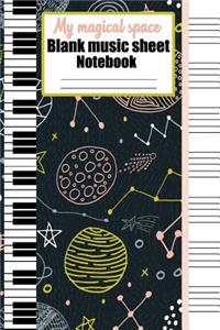 My magical space blank music sheet notebook