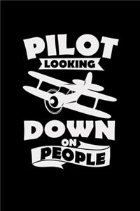 Pilot looking down on people