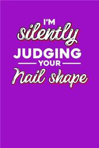 I'm silently judging your nail shape