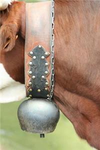 Close-Up of a Cow Bell on a Cow Journal