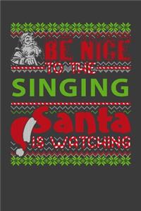 Be Nice To The Singing Santa Is Watching