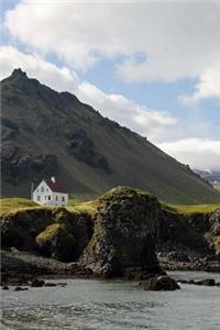 View of a Lonely House, the Sea, and a Mountain in Iceland Journal