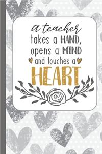 A Teacher Takes a Hand and Touches a Heart