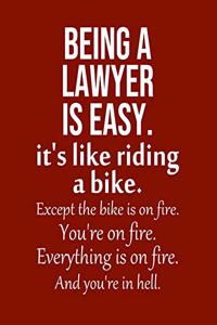 Being a Lawyer is Easy. It's like riding a bike. Except the bike is on fire. You're on fire. Everything is on fire. And you're in hell.