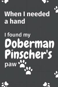 When I needed a hand, I found my Doberman Pinscher's paw