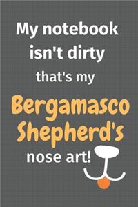 My notebook isn't dirty that's my Bergamasco Shepherd's nose art!