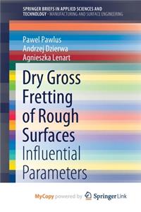 Dry Gross Fretting of Rough Surfaces