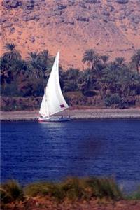 A Felucca Sailing Boat Traversing the Nile River Near Aswan, Egypt Journal