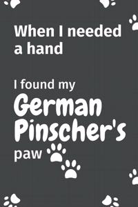 When I needed a hand, I found my German Pinschers's paw