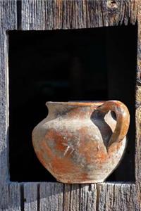 Handmade Rustic Ceramic Pitcher on a Wooden Ledge Journal