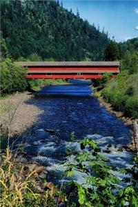 Side View of a Red Covered Bridge in Oregon