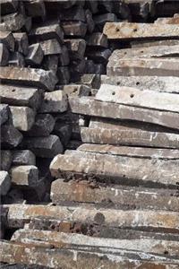 Pile of Concrete Railroad Train Ties Journal