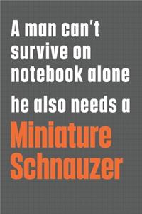 A man can't survive on notebook alone he also needs a Miniature Schnauzer