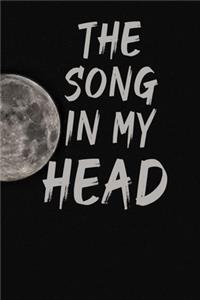 The Song in My Head Notebook with the moon in the background