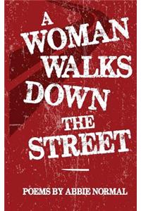 A Woman Walks Down the Street